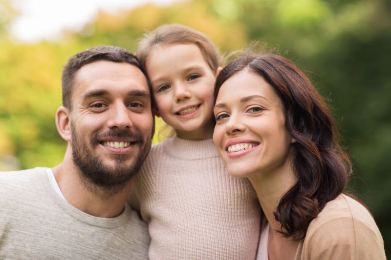 happy family in summer park